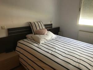 Postel nebo postele na pokoji v ubytování Chale a 25 minutos de Madrid cerca de Somosierra + 35 fotografií