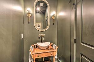 a bathroom with a sink and a mirror at The Ultimate Luxury Retreat on Lake Burton! in Clayton +27 photos