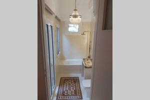 A bathroom at Mid century character house in Argostoli