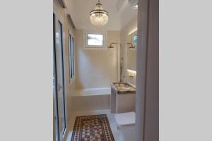 A bathroom at Mid century character house in Argostoli