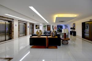 The lobby or reception area at Advanced Hotel & Flats Cuiabá