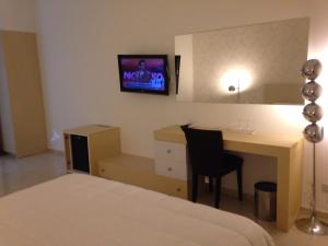 Voodi või voodid majutusasutuse Crystal Hotel toas
