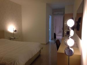 Voodi või voodid majutusasutuse Crystal Hotel toas