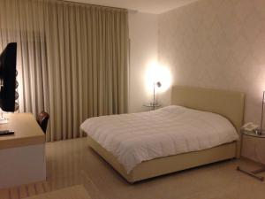 Voodi või voodid majutusasutuse Crystal Hotel toas