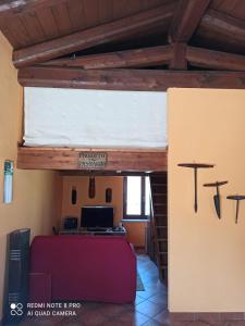 A television and/or entertainment centre at Natura e relax