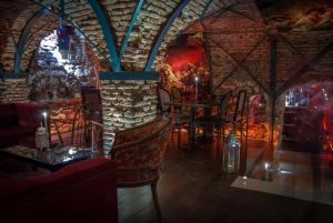 Casa Albert Boutique & Restaurant餐厅或其他用餐的地方