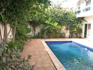 Bassein majutusasutuses Villa à Thiès avec piscine à 15mn de l'aéroport või selle lähedal