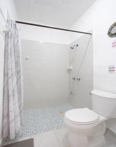 Koupelna v ubytování Hotel Casa Ariana
