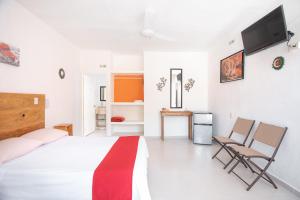 Postel nebo postele na pokoji v ubytování Hotel Casa Ariana