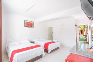 Postel nebo postele na pokoji v ubytování Hotel Casa Ariana
