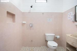 Koupelna v ubytování Hotel Casa Ariana