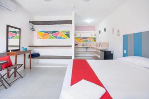 Postel nebo postele na pokoji v ubytování Hotel Casa Ariana