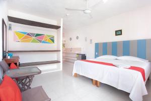 Postel nebo postele na pokoji v ubytování Hotel Casa Ariana