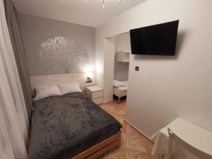 Postel nebo postele na pokoji v ubytování Gościnny Dom Kaola