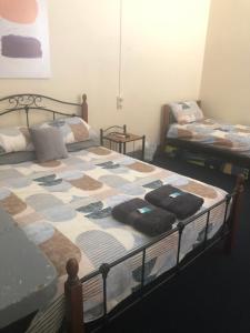 Кровать или кровати в номере Cornucopia hotel