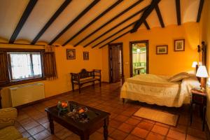 Posteľ alebo postele v izbe v ubytovaní Hotel Bodega La Venta