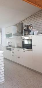 Kuchyňa alebo kuchynka v ubytovaní Summer Lounge Apartment
