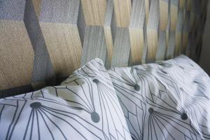 two white pillows on a bed with a blanket at Weindl's Ferienwohnung in Naila