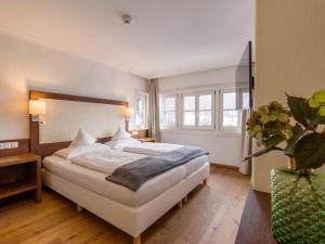 Voodi või voodid majutusasutuse Hotel Gasthof Blaue Quelle toas