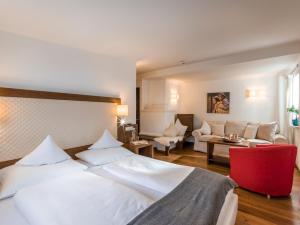 Voodi või voodid majutusasutuse Hotel Gasthof Blaue Quelle toas