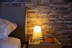 Postel nebo postele na pokoji v ubytování Ananas Apartments