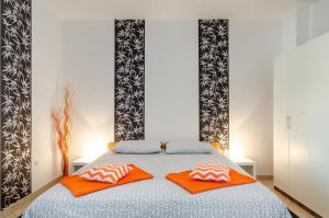 Postel nebo postele na pokoji v ubytování Ananas Apartments