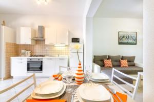 Kuchyň nebo kuchyňský kout v ubytování Ananas Apartments