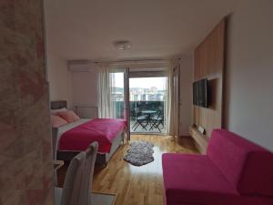Postel nebo postele na pokoji v ubytování Apartman Krasula Doboj