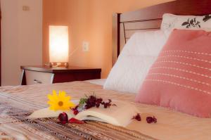 A bed or beds in a room at Villa Papoulas
