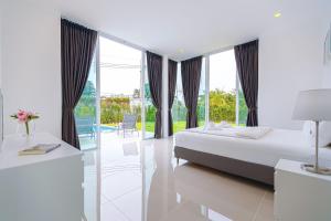 Postel nebo postele na pokoji v ubytování Modern 3 Bedroom Private Pool Villa KH-A1 + 43 fotografií