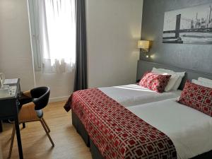 Hotel Boréal Nice tesisinde bir odada yatak veya yataklar