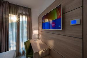Postel nebo postele na pokoji v ubytování HOTEL TRILAGO