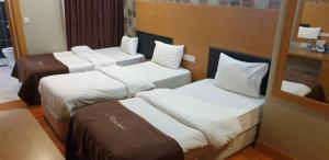 Voodi või voodid majutusasutuse luna hotel toas