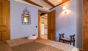 A bed or beds in a room at Hotel Apartamentos Melihah