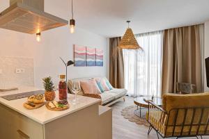 Svetainės erdvė apgyvendinimo įstaigoje Jable suites apartamentos de lujo en el centro