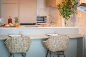 Kuchyň nebo kuchyňský kout v ubytování Jable suites apartamentos de lujo en el centro