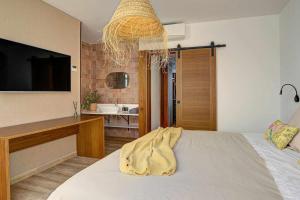 Imagen de la galería de Jable suites apartamentos de lujo en el centro, en Corralejo