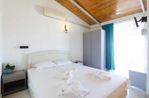 Posteľ alebo postele v izbe v ubytovaní Mark Hotel