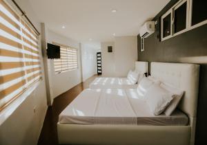 Postel nebo postele na pokoji v ubytování Viajeros Hostel Boracay