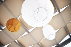 two rolls of paper hanging from a ceiling at Antigoni Villas in Gavrio
