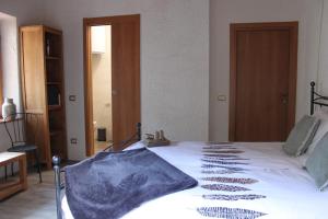 Postel nebo postele na pokoji v ubytování Rustico Lago di Como b&b