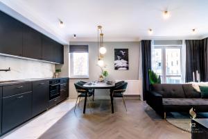 Kuchnia lub aneks kuchenny w obiekcie Apartamenty Flat White Obywatelska 49
