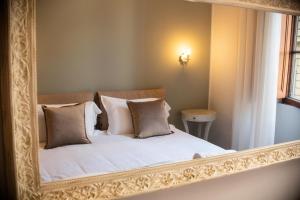 Posteľ alebo postele v izbe v ubytovaní B&B Dimora Sassetti 6