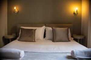 Posteľ alebo postele v izbe v ubytovaní B&B Dimora Sassetti 6