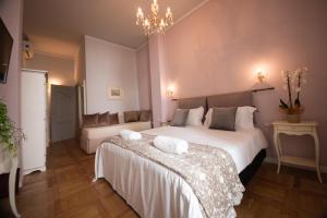 Posteľ alebo postele v izbe v ubytovaní B&B Dimora Sassetti 6