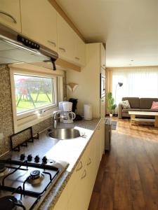 Η κουζίνα ή μικρή κουζίνα στο Luxe chalet 5