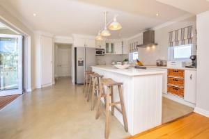 Køkken eller tekøkken på Thesen Island Holiday House