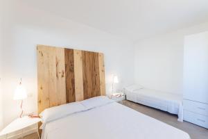 Postel nebo postele na pokoji v ubytování Agriturismo Umbrian Sunrise