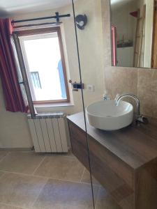 a bathroom with a sink and a window at Rose in Bonnieux +16 photos