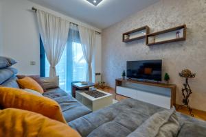 TV a/nebo společenská místnost v ubytování Centar M LUX Zlatibor